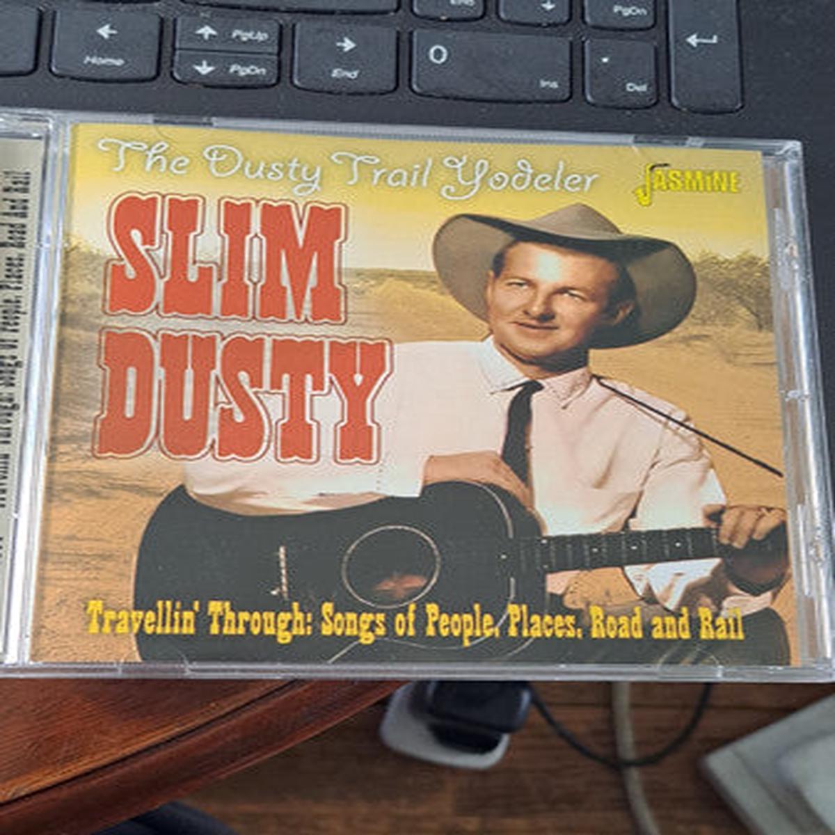 DUSTY, SLIM – TRAVELLIN’ THROUGH : SONGS OF PEOPLE .. – CD