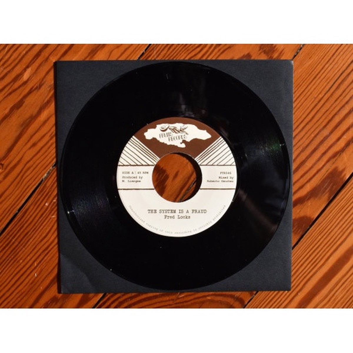 Fred Locks / The 18th Parallel – The System Is A Fraud – 7″ Vinyl